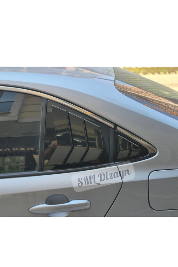 The GR Sport style rear quarter side window louver vent cover set for Toyota Corolla E210 Sedan models (2019-2026) is custom-molded to match lower and upper side glass contours with exact OEM precision. Manufactured from high-grade flexible ABS plastic featuring a factory high-gloss Piano Black finish, this 4-piece window vent set (left and right sides) requires no additional painting or prep work. Designed to give the side profile a lower, wider, and more aggressive sport sedan 