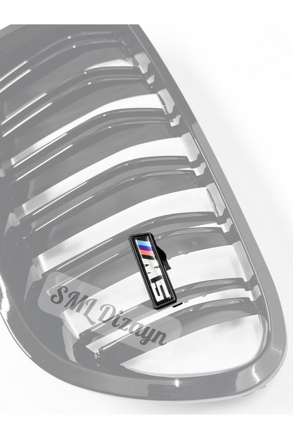 f10 m5 ön panjur logosu